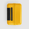 Yellow carry on suitcase topview of carry handle and telescopic handle