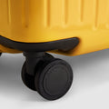 Yellow carry on suitcase closeup of Hinomoto 360 spinner wheels