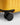 Yellow carry on suitcase closeup of Hinomoto 360 spinner wheels