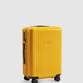 gold yellow carry on suitcase with 4 wheels - side view